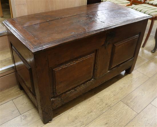 An 18th century oak and elm coffer, with candle box, W.116cm